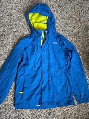 The North Face Kids Blue Rain Jacket with Neon Yellow Lining